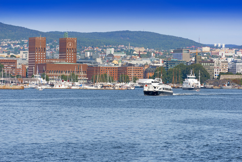 View of Oslo Radhuset (town hall) from the sea, Oslo, Norway. Photo: Nataliia Anisimova