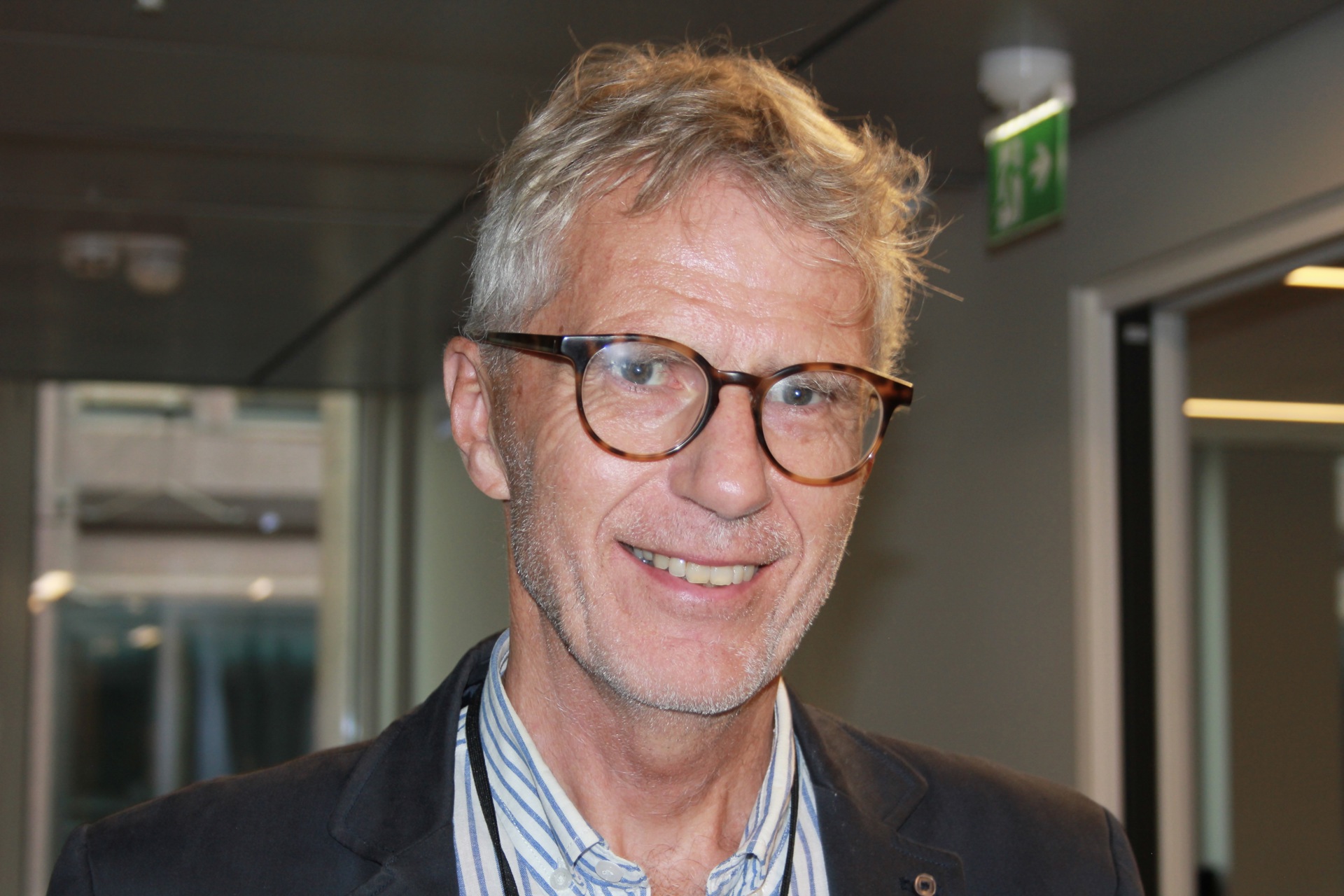 Bilde av Lars Lien, en manni begynnelsen av sekstiårene med briller.